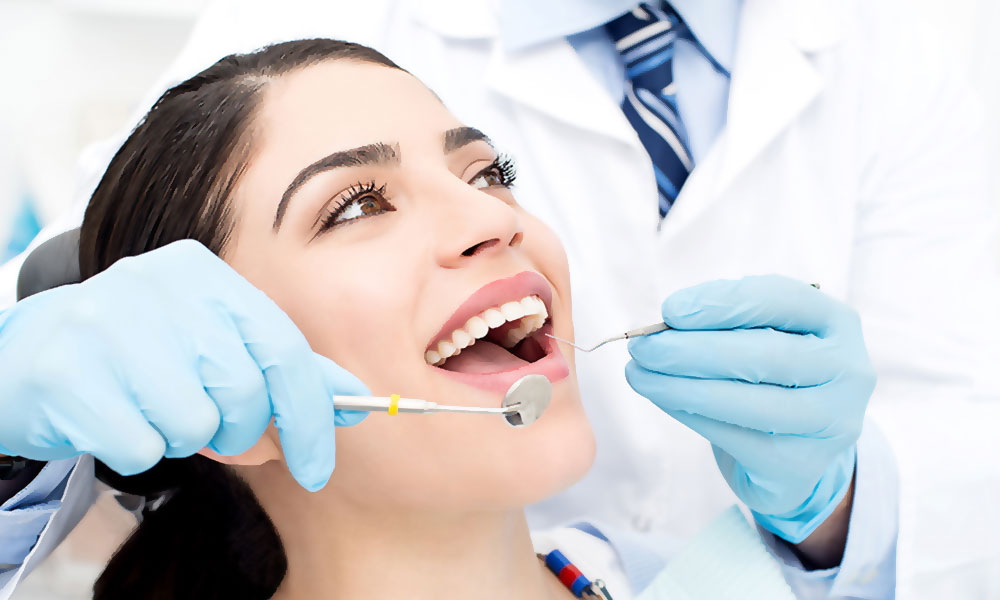 دندانپزشکی طرف قرارداد با بیمه ملت در تهران